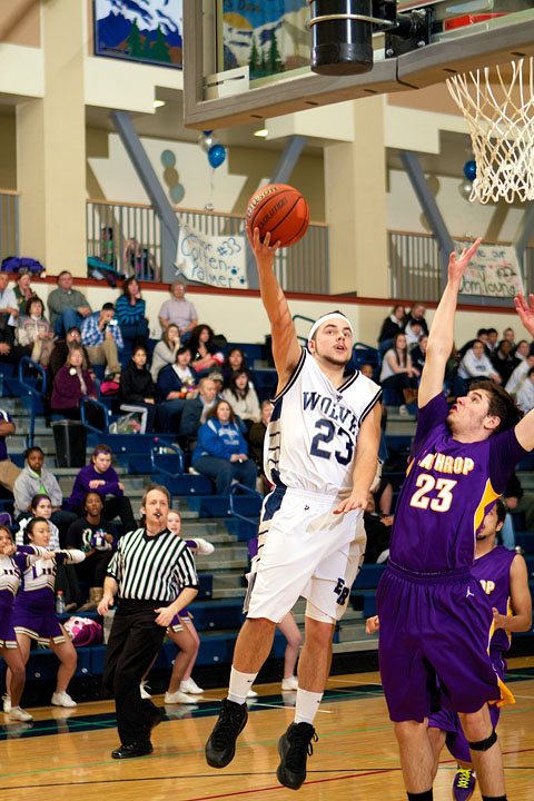 Senior Kyle Taylor takes it to the hoop