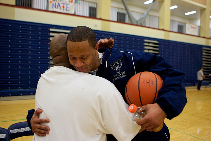 Coach Bowyer and Varsity Coach Craig Harrison hug after Coach Bowyers' last game as JV coach