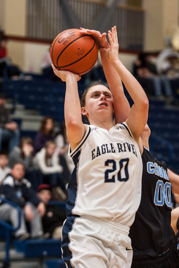 Freshman Lauren Frost gets hit going to the hoop.