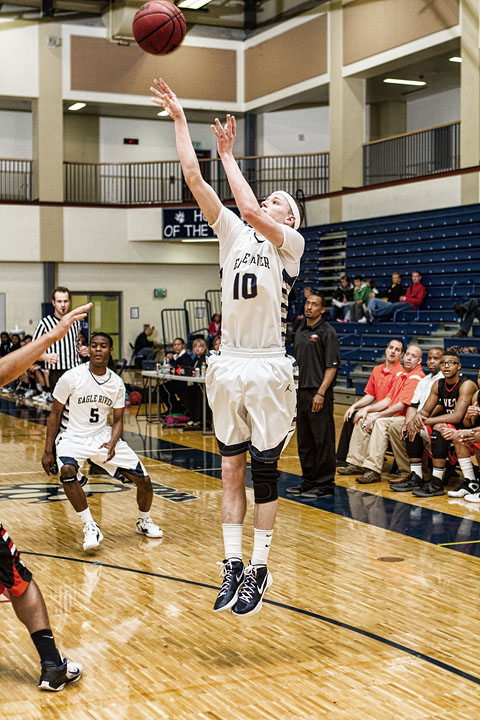 Nicolas Montgomery throws up a shot against West