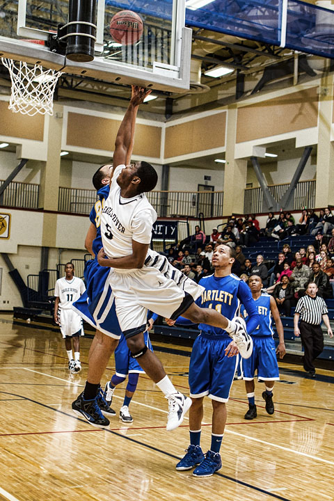 Senior Chris Parker cuts baseline for a backboard slapping lay-up