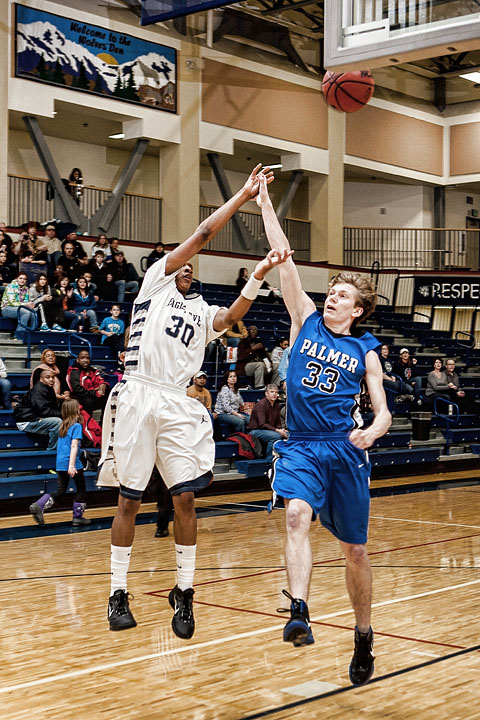 Freshman Chaz Jenkins throws up an incredible shot against Palmer in the Wolves Den