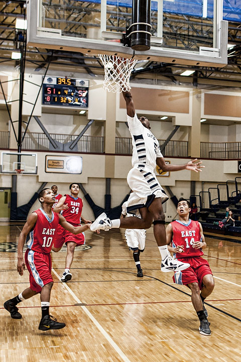 Senior Chris Parker throws up an acrobatic shot against East Anchorage