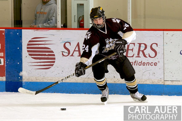 January 11th, 2013: A Battle Mountain player sets up for a slap shot from close to the blue line in the game at the Apex Ice Arena against Ralston Valley on Friday night in Arvada, CO