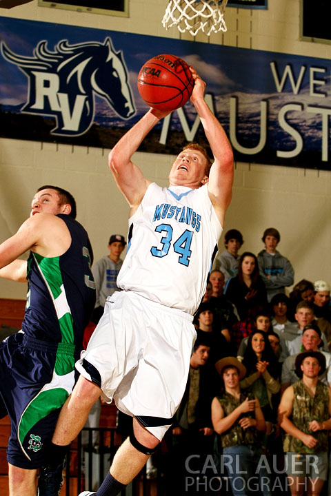 January 16th, 2013:  Ralston Valley Mustang senior Michael Dell (34) puts up a shot against the visiting Standley Lake Gartors in the game at Ralston Valley High School.