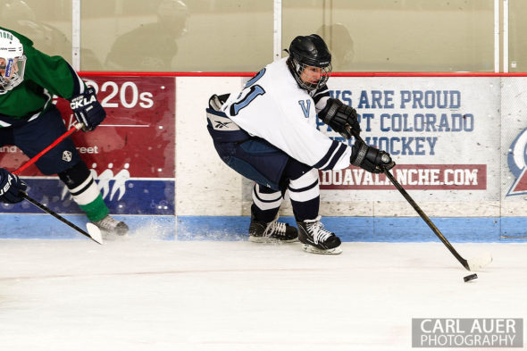 February 22, 2013: Arvada, Colorado - Valor Christian senior forward Ryan Close comes off the boards with the puck in the game against Standley Lake High School at the Apex Center in Arvada