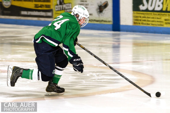 February 22, 2013: Arvada, Colorado - Standley Lake Gators forward Jeff Moffat flies down the ice with the puck in the playoff game against Valor Christian at the Apex Center in Arvada