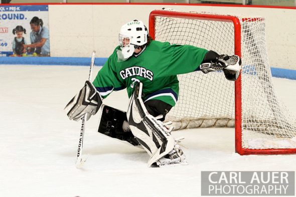 February 6th, 2013: Standley Lake Gators goalie Tyler Goff (33) tries to make a save in the game against the Ralston Valley Mustangs at the Apex Ice Arena in Arvada, Colorado