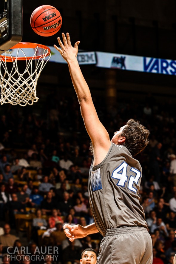 March 15, 2013: Legend Titans junior Zach Mihalicz attempts a shot in the CHSAA 5A Final Four game against the Denver East Angels at the Coors Events Center in Boulder, Colorado