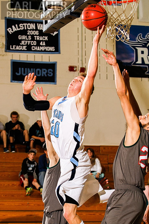 February 27th 2013: Arvada, Colorado - Ralston Valley Mustang senior Spencer Svejcar attempts a shot in the Mustangs playoff game against Smoky Hill on Wednesday night at Ralston Valley High School