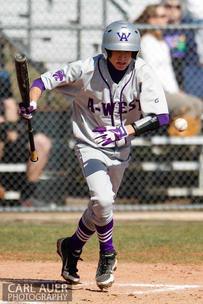 April 24th, 2013: A Arvada West player attempts to reach 1st base on a bunt in the Wildcats game against the Ralston Valley Mustangs at Ralston Valley High School in Arvada, Colorado