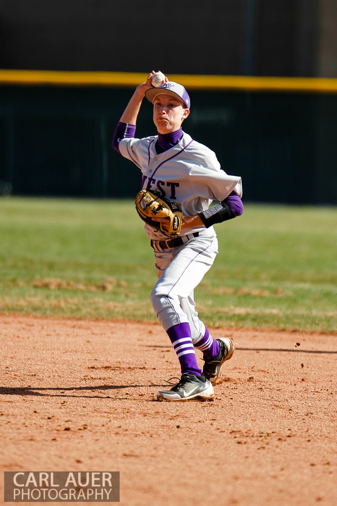 April 24th, 2013: The Arvada West second baseman sets to throw a Ralston Valley Mustang runner out at Ralston Valley High School in Arvada, Colorado