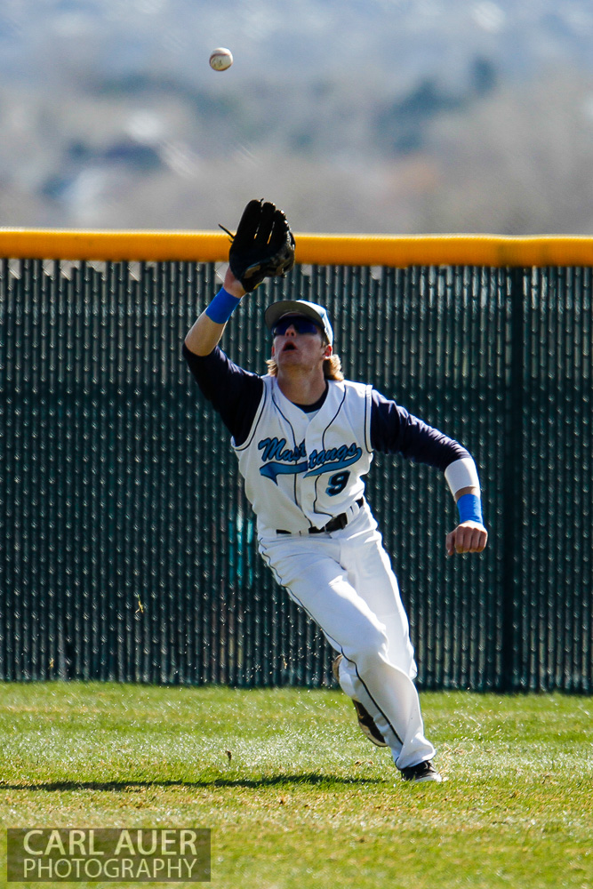 April 24th, 2013: The Ralston Valley Mustangs right fielder makes a catch in the game against Arvada West at Ralston Valley High School in Arvada, Colorado