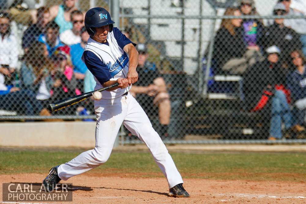 April 24th, 2013: A Ralston Valley Mustangs batter makes contact with a pitch in the game against Arvada West at Ralston Valley High School in Arvada, Colorado