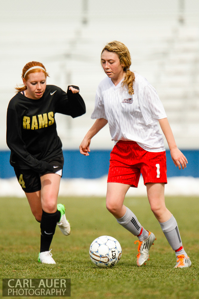 April 25th, 2013: Arvada Bulldog Aspen Beckwith (1) takes control of the ball in Arvada High Schools game against the visiting Green Mountain Rams at the North Area Athletic Complex in Arvada, Colorado