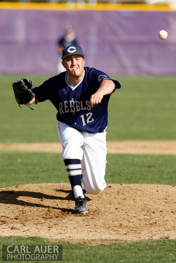 April 26th, 2013: Columbine Rebels pitcher Kyle Lopez (12) delivers a pitch in the league game against the Arvada West High School Wildcats in Arvada, Colorado