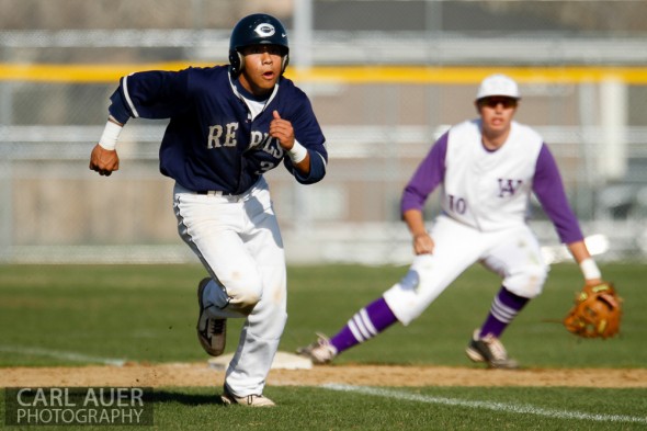 April 26th, 2013: Columbine Rebels baserunner Donny Ortiz (3) breaks towards home in the game against the Arvada West High School Wildcats in Arvada, Colorado