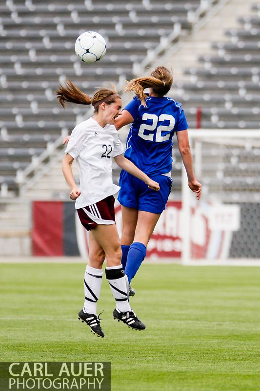 May 22, 2013 - Cheyenne Mountain Indians senior midfielder Amy Eckert (22) is out jumped by a Broomfield Eagles player in a header attempt during the CHSAA 4A Girls Soccer Championship Game at Dick's Sporting Goods Park in Commerce City, Colorado