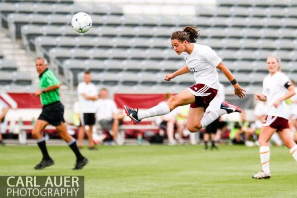 May 22, 2013 - Cheyenne Mountain Indians junior defender Tori Burnett (11) flies through the air for a kick in the CHSAA 4A Girls Soccer Championship Game against the Broomfield Eagles at Dick's Sporting Goods Park in Commerce City, Colorado