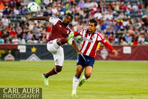 May 25th, 2013 - Colorado Rapids forward Edson Buddle (9) attempts to collect a pass as he grabs the shorts of Chivas USA defender Mario de Luna (3) in the first half of action in the MLS match between Chivas USA and the Colorado Rapids at Dick's Sporting Goods Park in Commerce City, CO