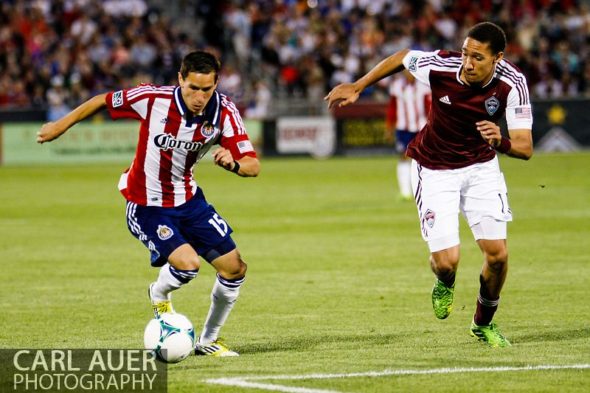 May 25th, 2013 - Chivas USA midfielder Eric Avila (15) brings the ball towards the goal against Colorado Rapids defender Chris Klute (15) in the second half of the MLS match between Chivas USA and the Colorado Rapids at Dick's Sporting Goods Park in Commerce City, CO