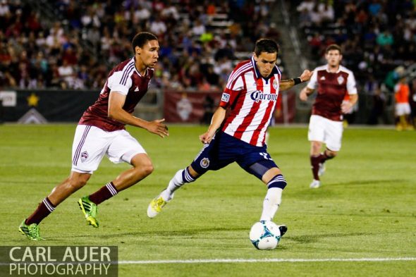 May 25th, 2013 - Chivas USA midfielder Eric Avila (15) attempts a shot past Colorado Rapids defender Chris Klute (15) in the second half of the MLS match between Chivas USA and the Colorado Rapids at Dick's Sporting Goods Park in Commerce City, CO