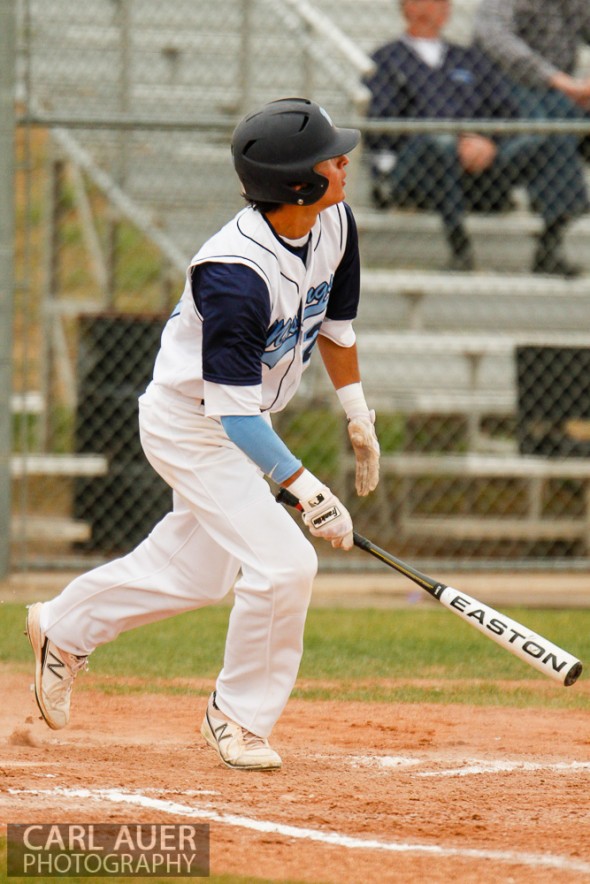 April 30th, 2013: Ralston Valley Mustangs junior Jacob Gallegos (27) watches the ball sail over the fence for a home run in the game against the Columbine Rebels at Ralston Valley High School