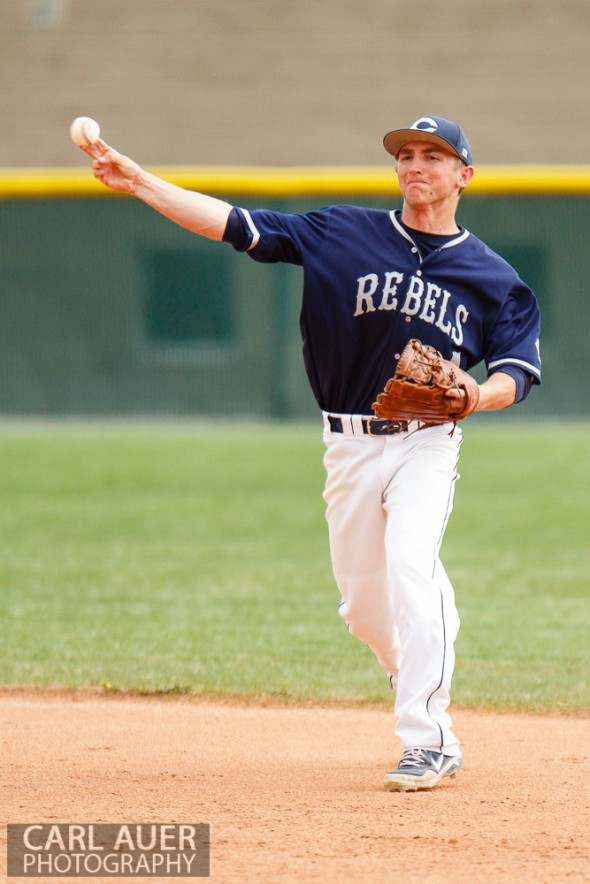 April 30th, 2013: Columbine Rebel senior Logan Smith (34) attempts to throw a runner out at first base in the game against the Ralston Valley Mustangs at Ralston Valley High School