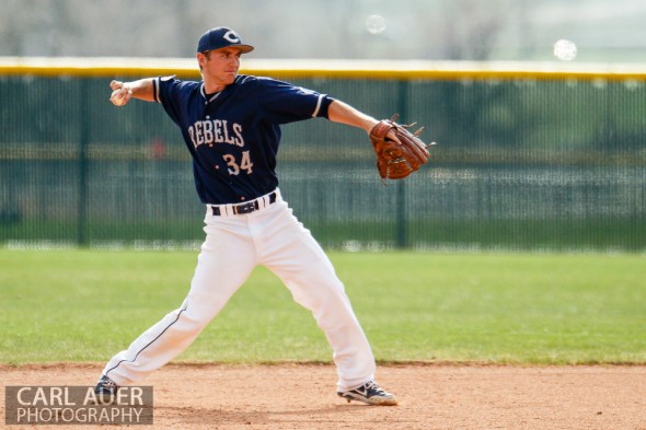 April 30th, 2013: Columbine Rebel senior Logan Smith (34) attempts to throw a runner out at first base in the game against the Ralston Valley Mustangs at Ralston Valley High School