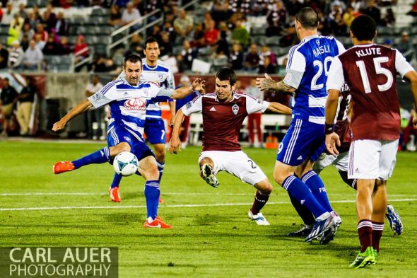 June 1st, 2013 - Colorado Rapids midfielder Nathan Sturgis (24) attempts to break up a shot attempt by FC Dallas midfielder Andrew Jacobson (4) in second half action of the MLS match between FC Dallas and the Colorado Rapids at Dick's Sporting Goods Park in Commerce City, CO