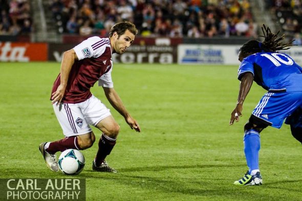 June 15th, 2013 - Showing off his ball handling skills, Colorado Rapids midfielder Brian Mullan (11) attempts to get past San Jose Earthquake midfielder Walter Martinez (10) in the second half of the MLS match between San Jose Earthquake and the Colorado Rapids at Dick's Sporting Goods Park in Commerce City, CO