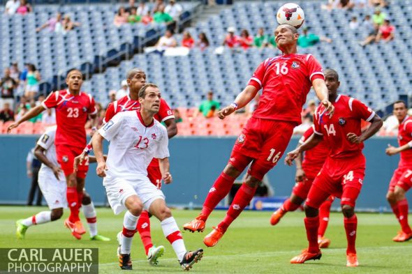 July 14 2013:  Panama Forward Rolando Blackburn (16) breaks up a Canada corner kick in the first half of the CONCACAF Gold Cup soccer match between Panama and Canada at Sports Authority Field in Denver, CO. USA.