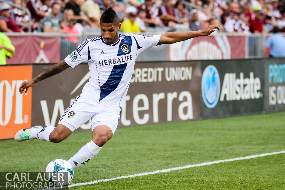 July 27th, 2013 - LA Galaxy defender Sean Franklin (5) "saves" the ball from going out of bounds as he crosses a pass towards the goal in second half action of the Major League Soccer match between the LA Galaxy and the Colorado Rapids at Dick's Sporting Goods Park in Commerce City, CO