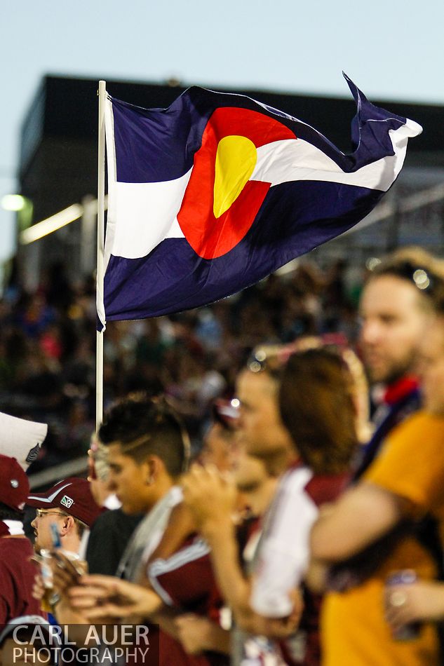 July 17th, 2013 - A Colorado state flag is waved by a Rapids fan after a Colorado goal in the second half of action in the Major League Soccer match between the New England Revolution and the Colorado Rapids at Dick's Sporting Goods Park in Commerce City, CO