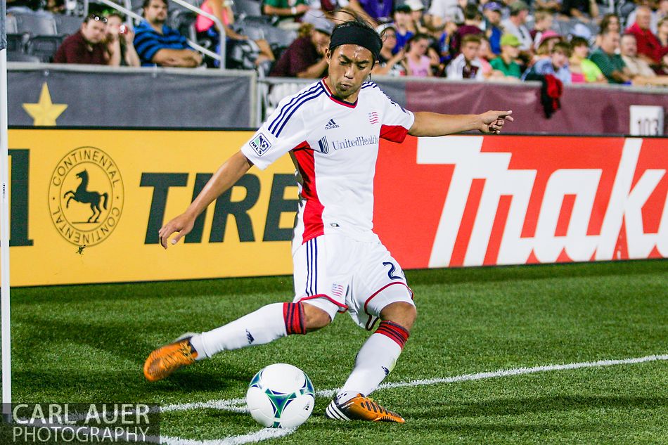 July 17th, 2013 - New England Revolution midfielder Lee Nguyen (24) takes a corner kick in the second half of the Major League Soccer match between the New England Revolution and the Colorado Rapids at Dick's Sporting Goods Park in Commerce City, CO