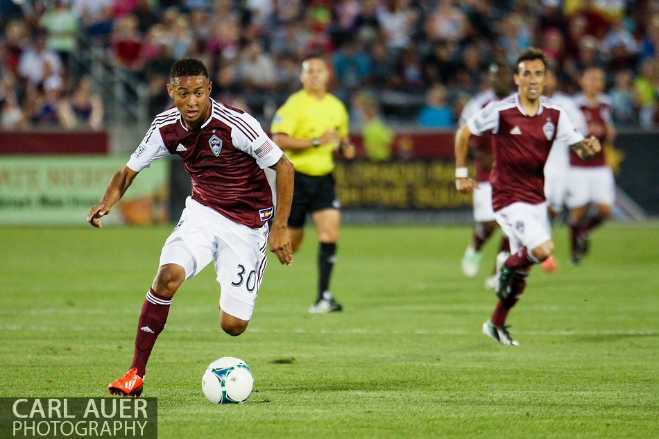 August 17th, 2013 - In his first MLS match, Colorado Rapids forward Gabriel Torres (30) drives the ball up the field in the first half of the Major League Soccer match between the Vancouver Whitecaps FC and the Colorado Rapids at Dick's Sporting Goods Park in Commerce City, CO