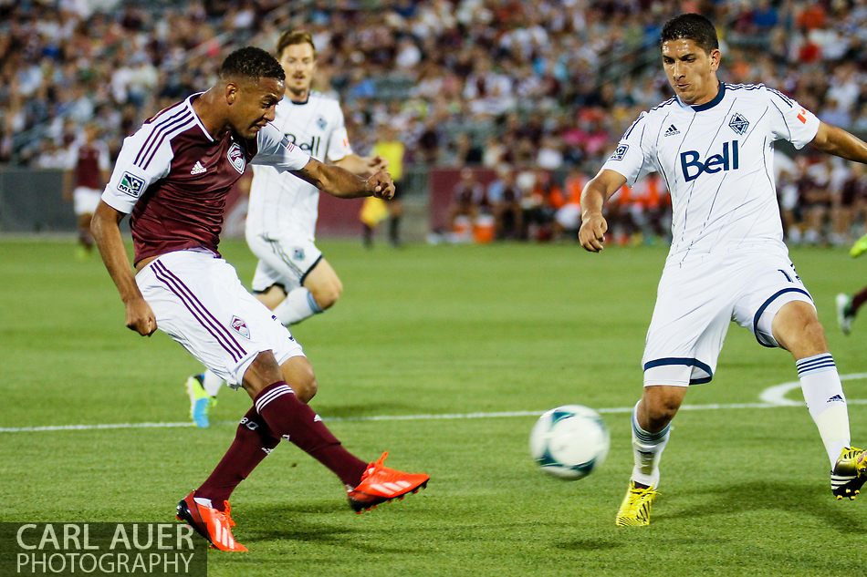 August 17th, 2013 - Colorado Rapids forward Gabriel Torres (30) takes a shot on goal in the first half of action in the Major League Soccer match between the Vancouver Whitecaps FC and the Colorado Rapids at Dick's Sporting Goods Park in Commerce City, CO